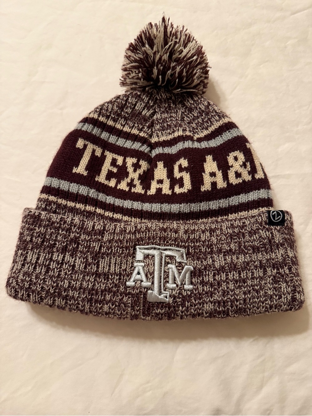 Texas A&M pom pom knit beanie hat in excellent condition.